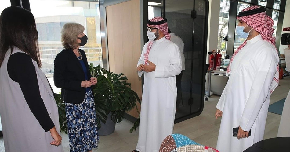 A group photo of several members who have visited The Collective Hub