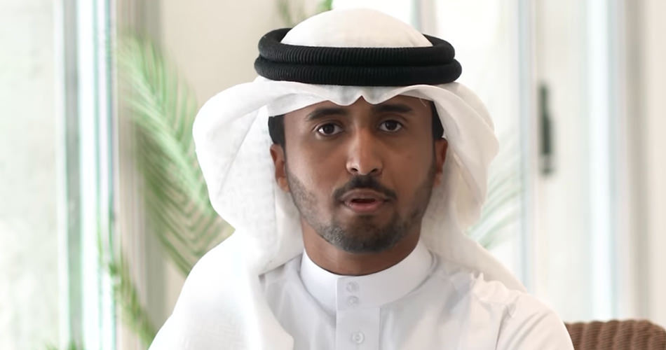 A man is looking at the camera