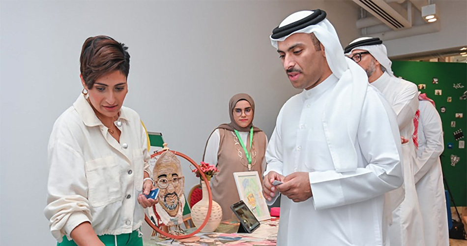 Several individuals are queuing up at a desk