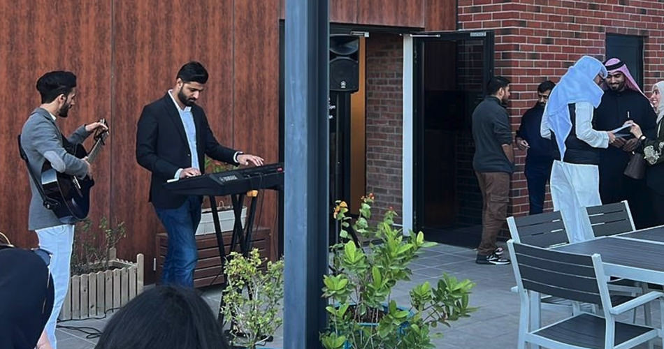 A community gathering is taking place outdoors